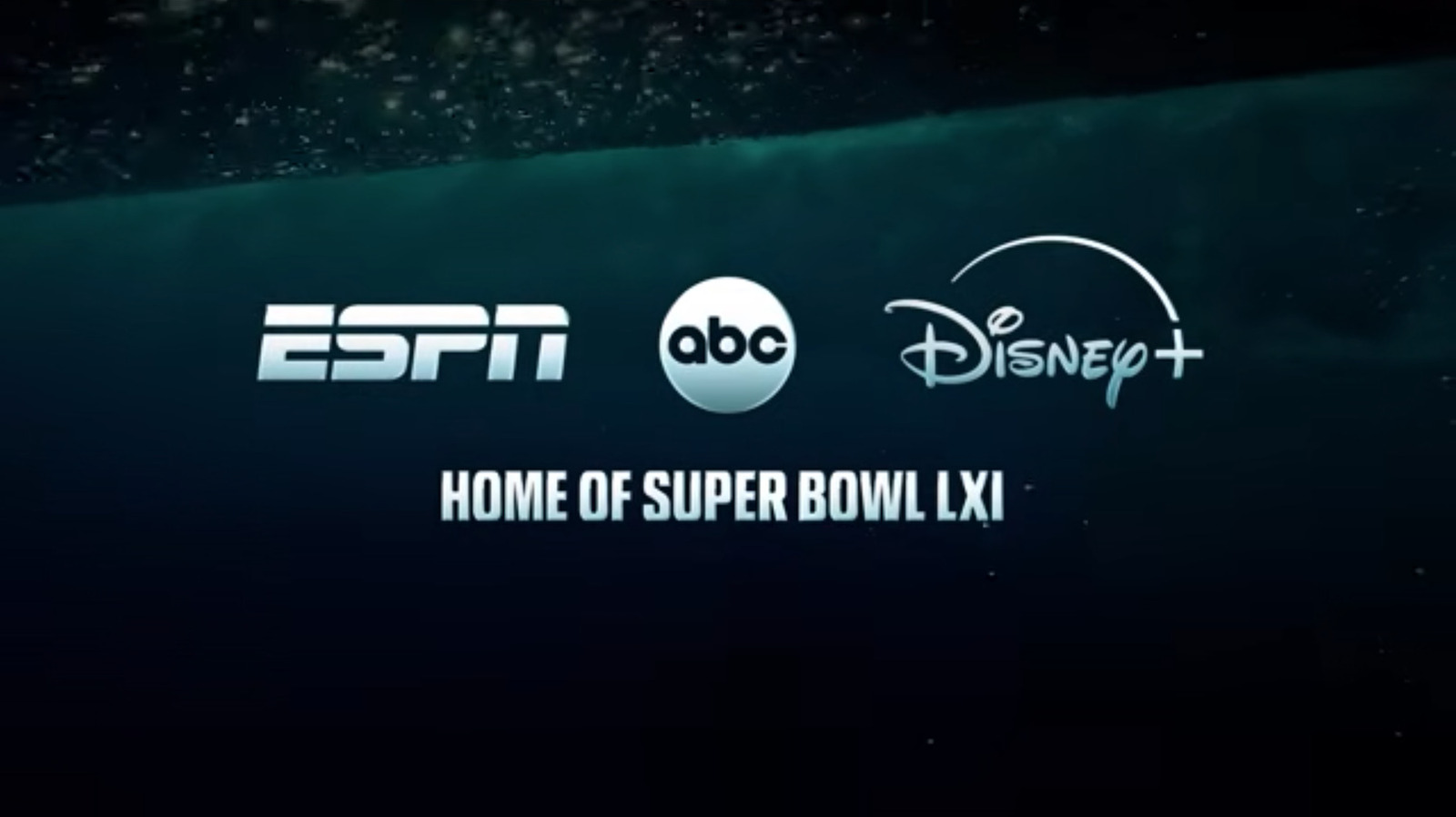 ESPN, ABC, and Disney+ logos appear above the words “Home of Super Bowl LXI” on a dark aquatic background.