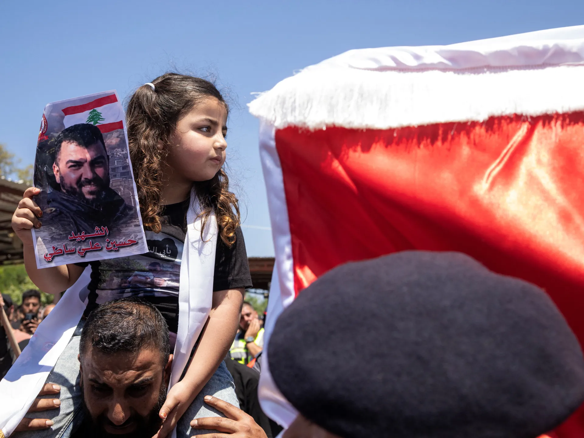 Lebanese girl mourns paramedic father killed in Israeli strike