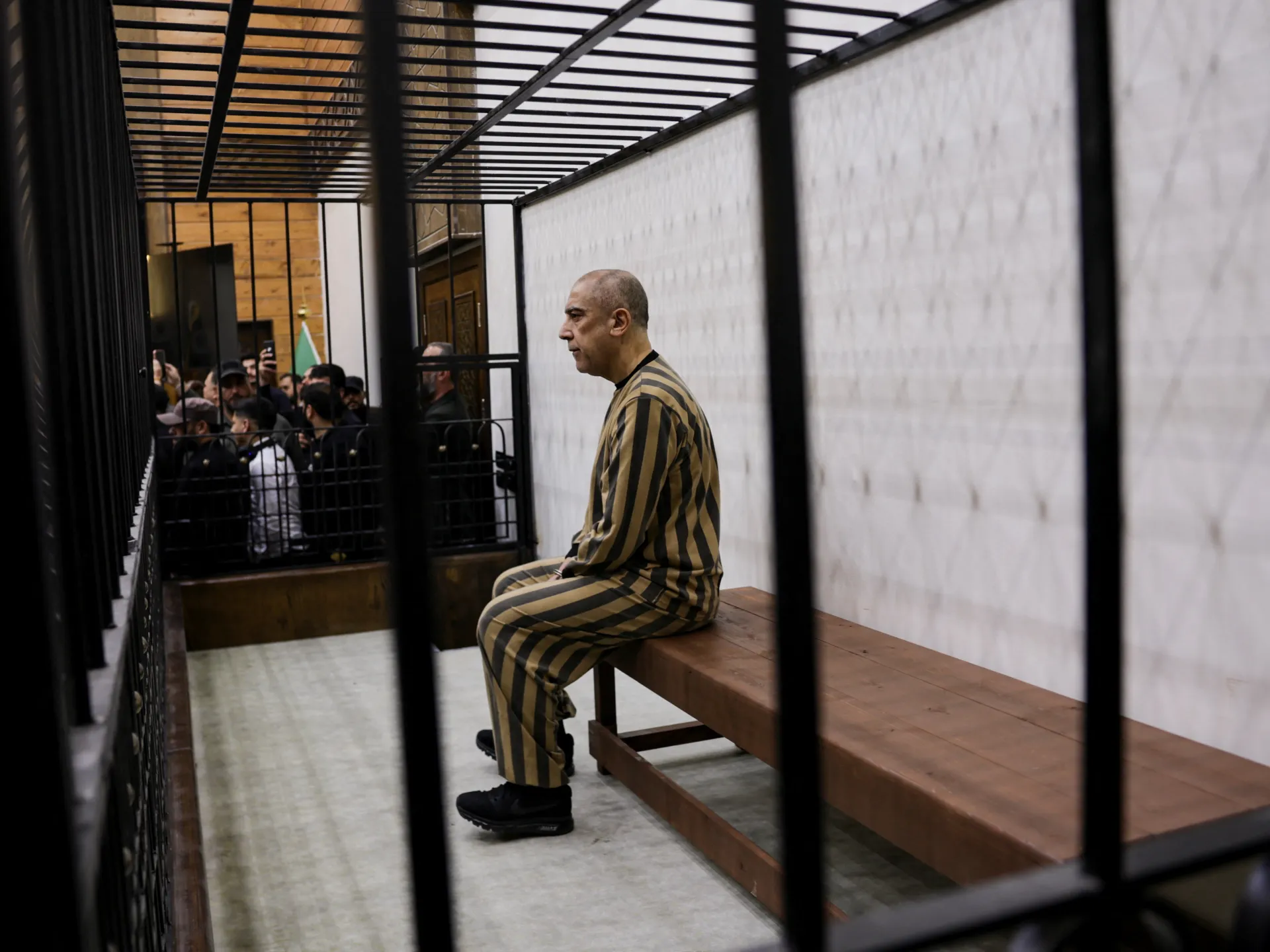 Syria puts first Assad-era official on trial in Damascus