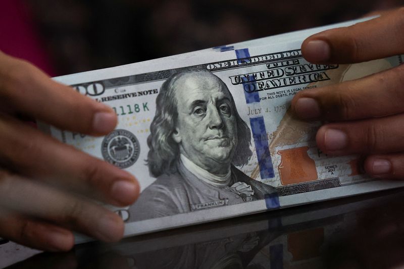 Dollar drifts lower as oil falls on Hormuz deal optimism