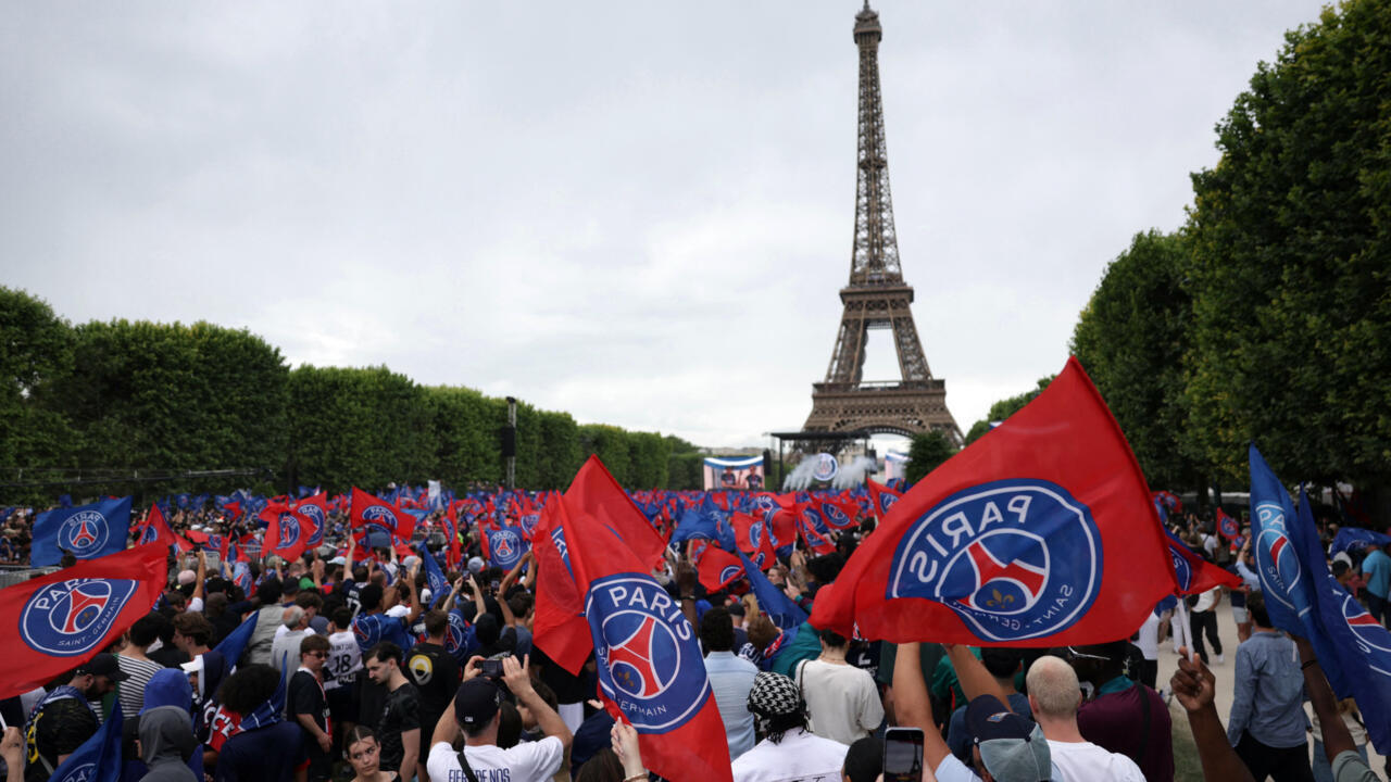 Huge crowds greet PSG players as they parade Champions League trophy in Paris