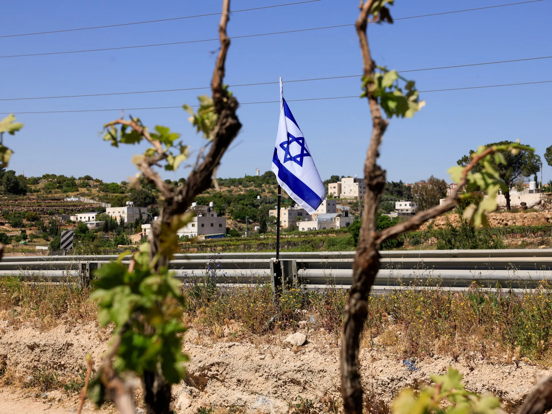 Israeli settlers force Palestinian family to exhume and rebury their father