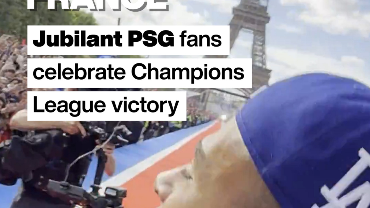 Jubilant PSG fans celebrate Champions League victory by the Eiffel Tower