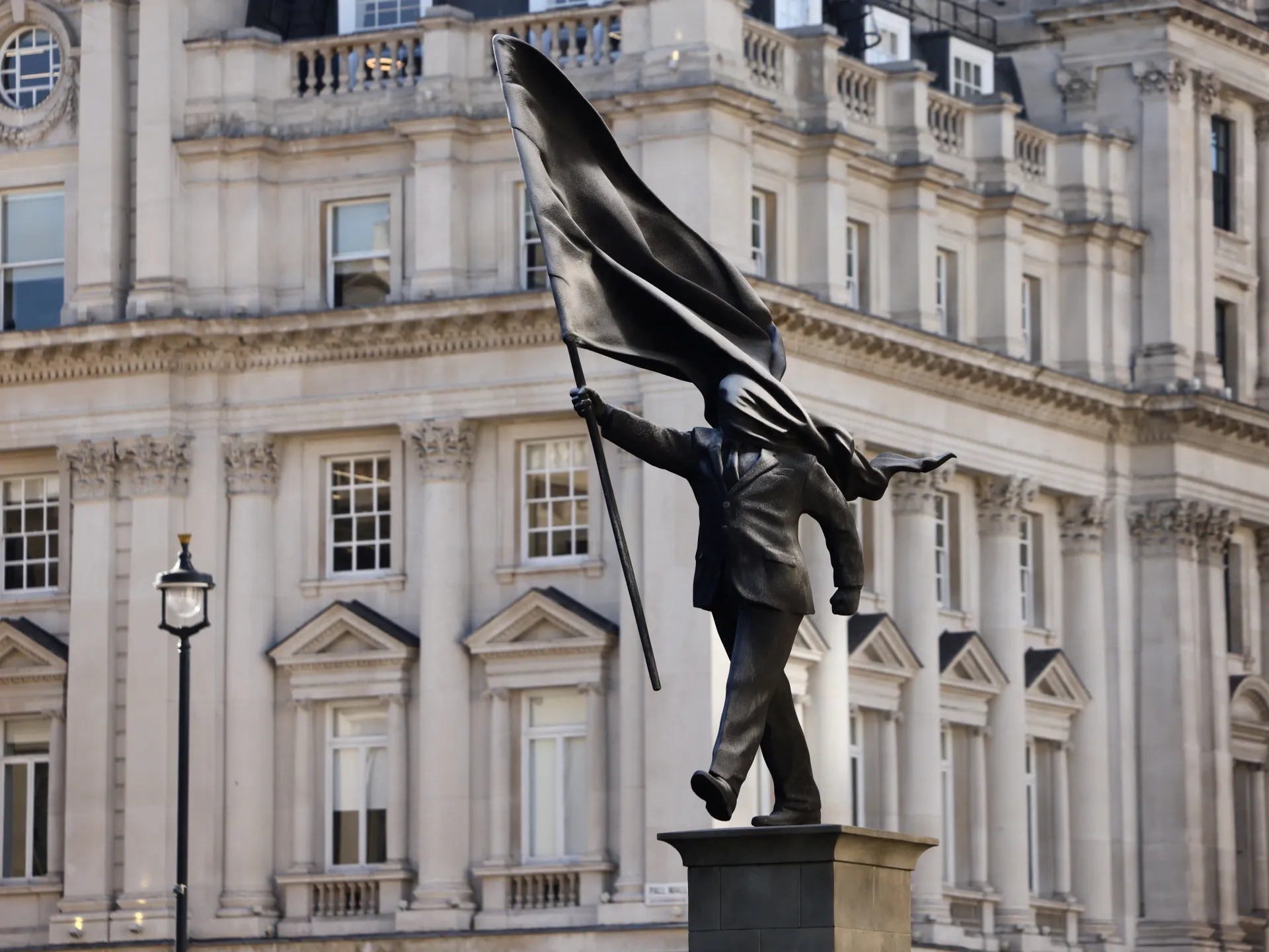 New Banksy sculpture appears to show politician blinded by his own flag