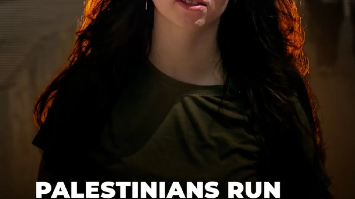 Palestinians run West Bank freedom marathon along separation wall