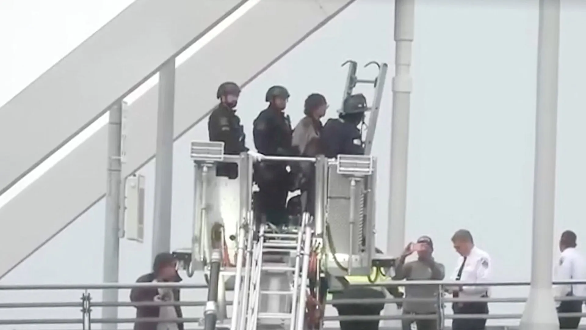 Police arrest protester after five-days atop Washington bridge