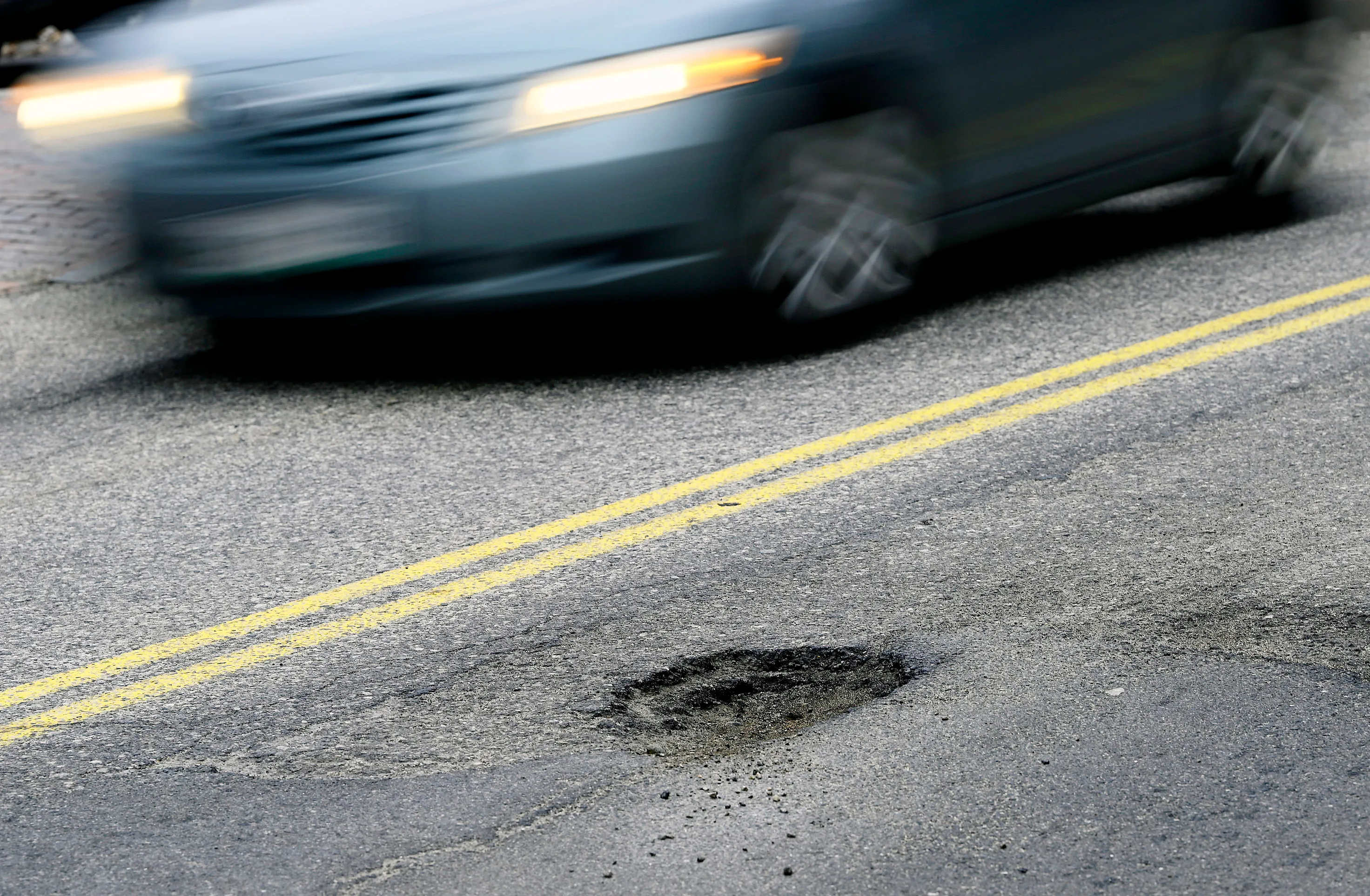 Potholes cost cities millions. This company is using AI and trucks to fix them.