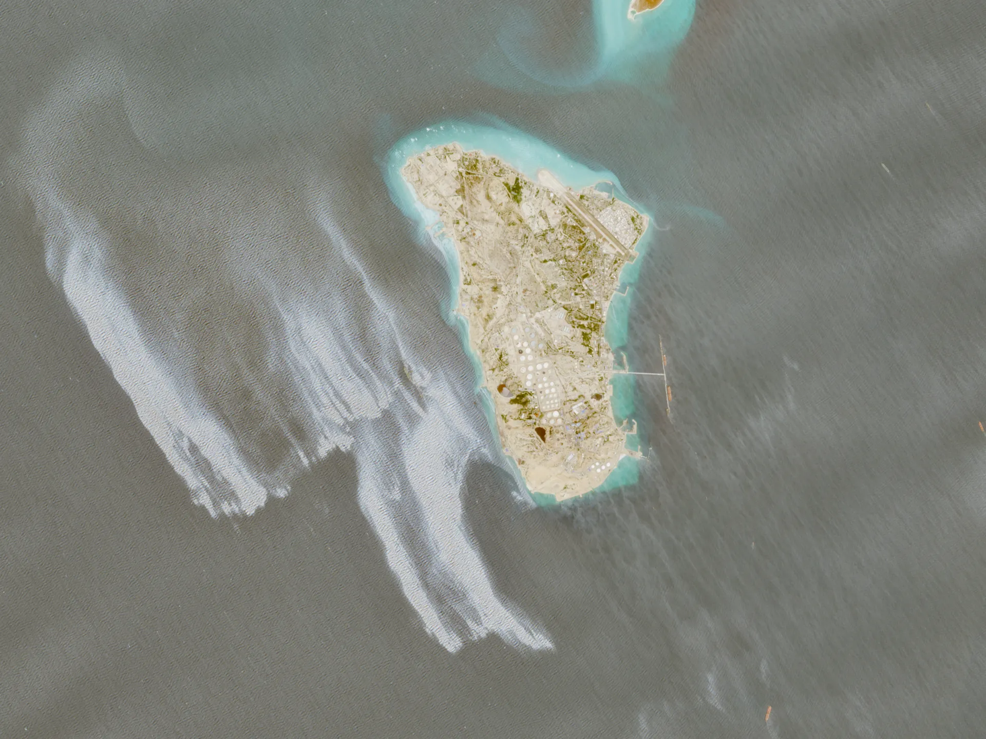 Satellite images show likely oil slick off Iran’s Kharg Island
