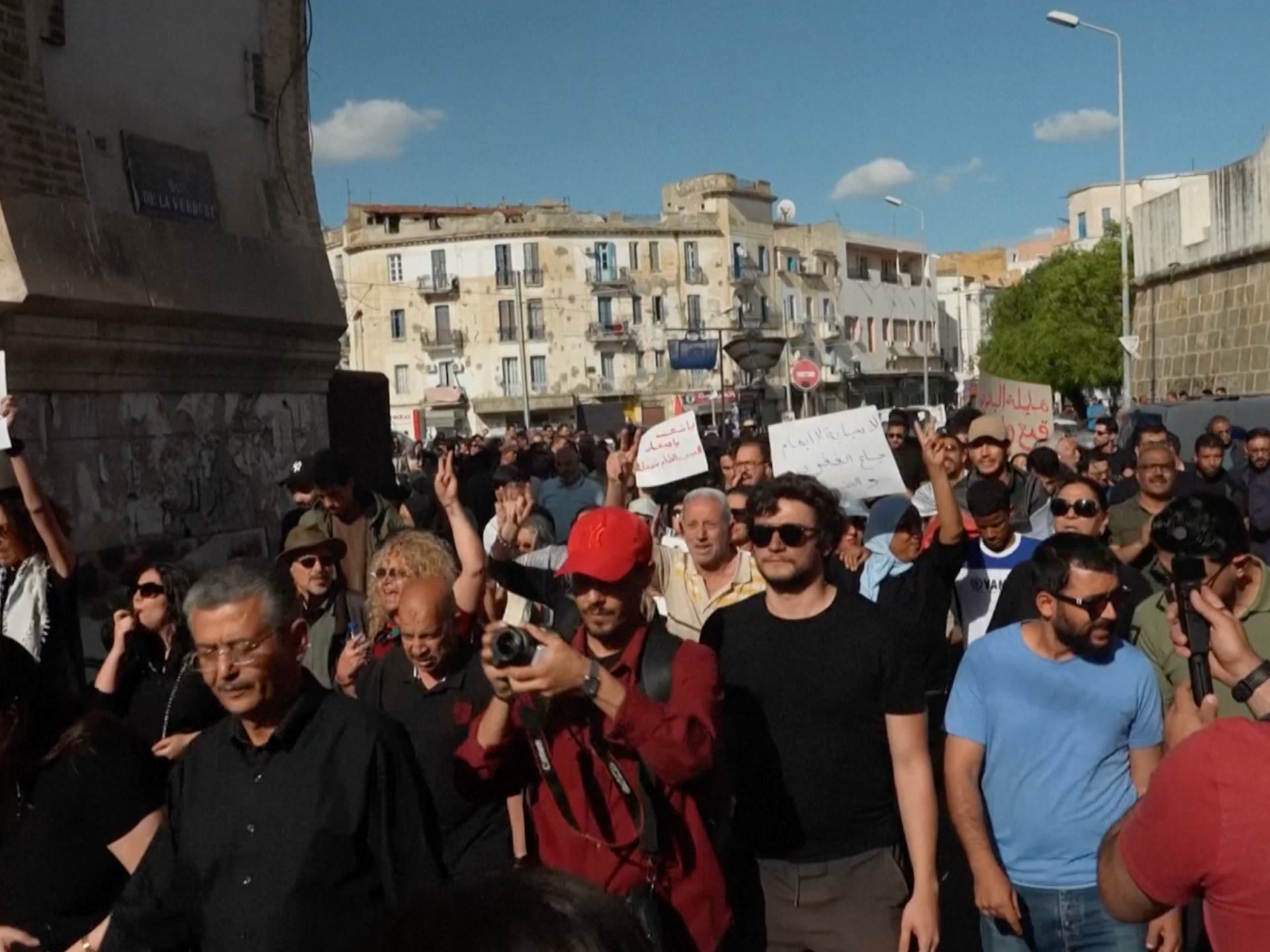 Tunisians rally amid economic crisis and political arrests