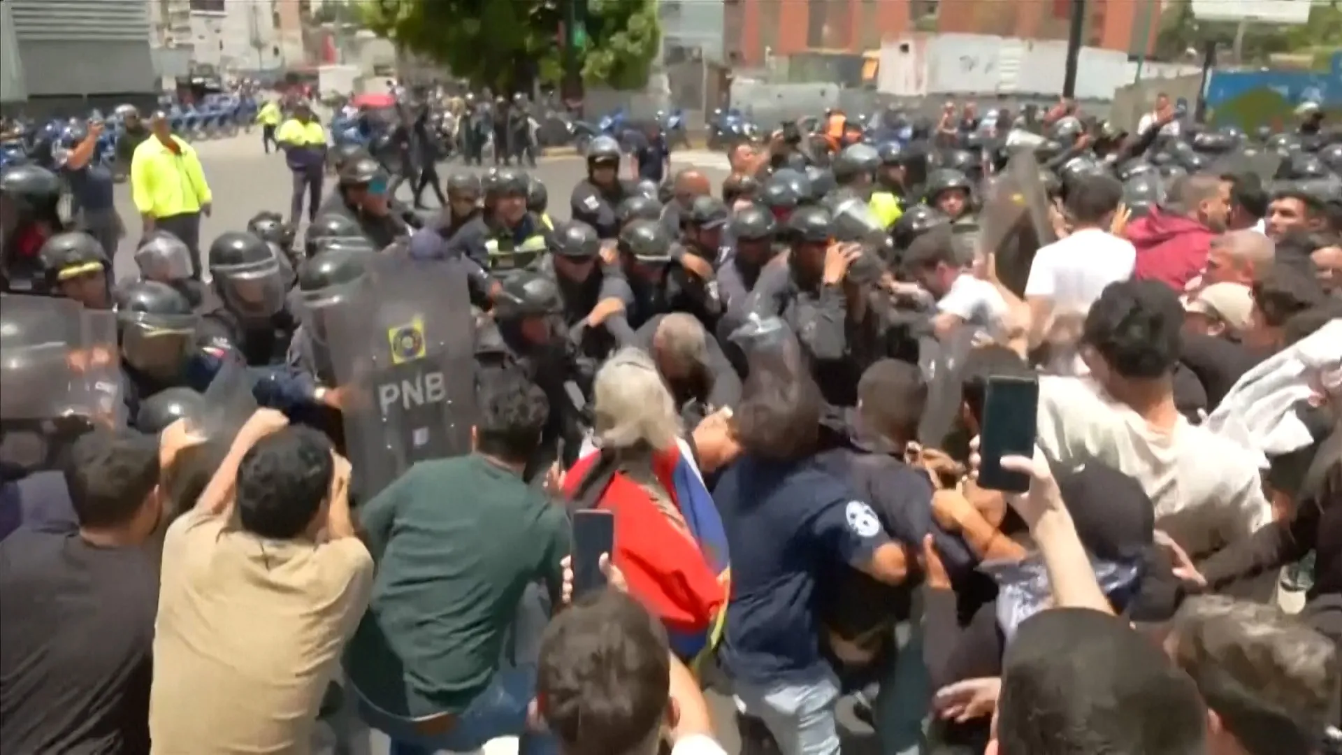 Venezuelan protesters clash with police at rally for political prisoners