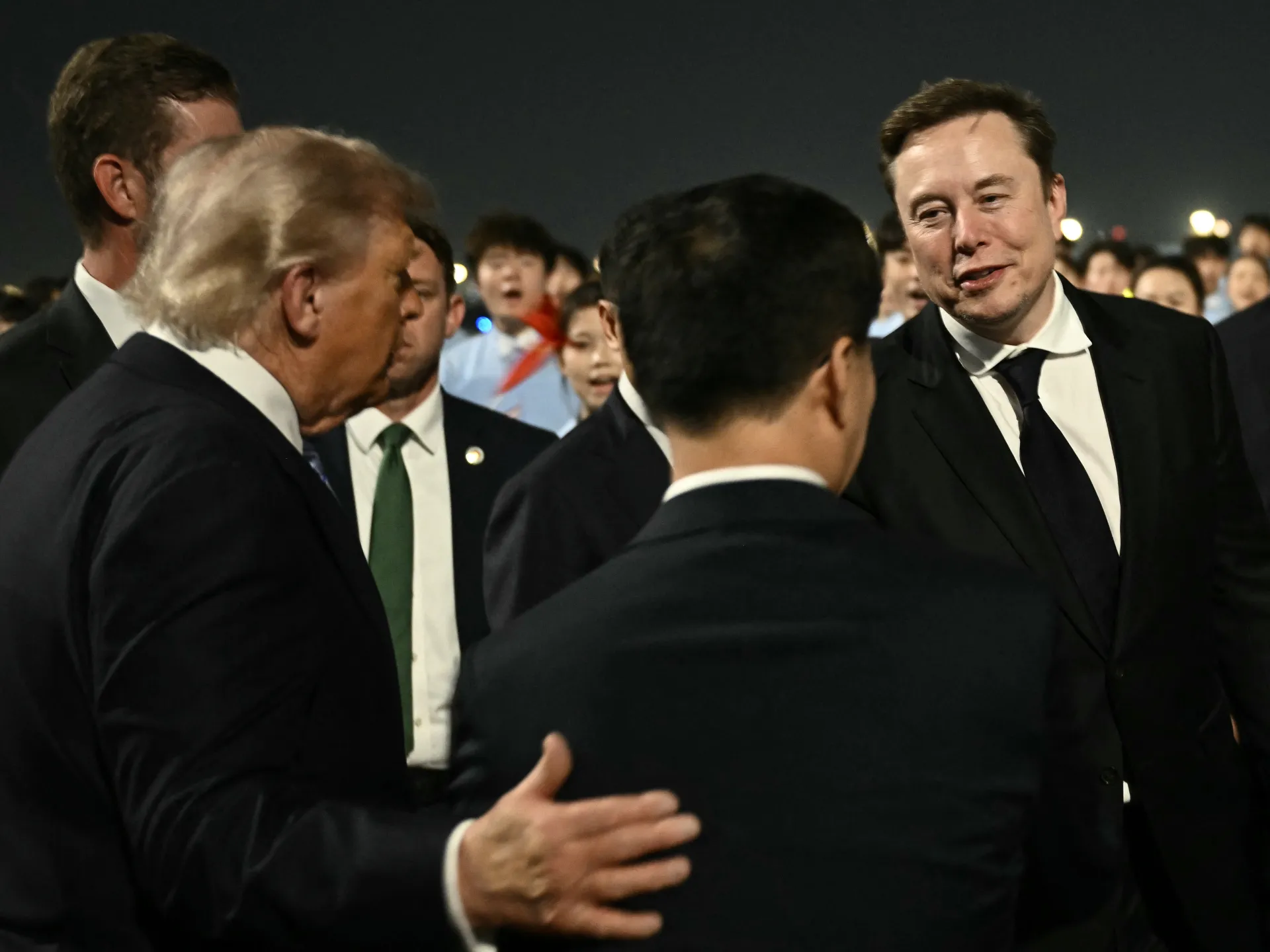 Who are the US CEOs in China with Trump, and what’s in it for them?