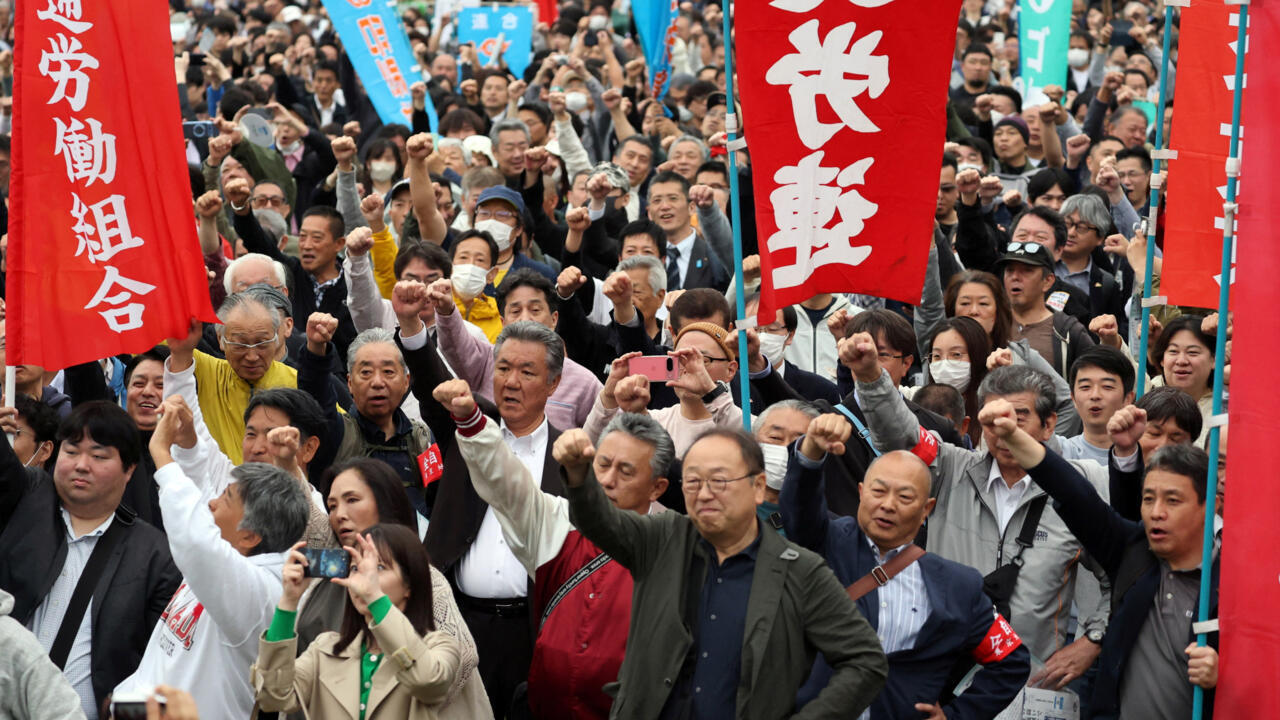 Workers across the world march for peace and better pay in May Day rallies