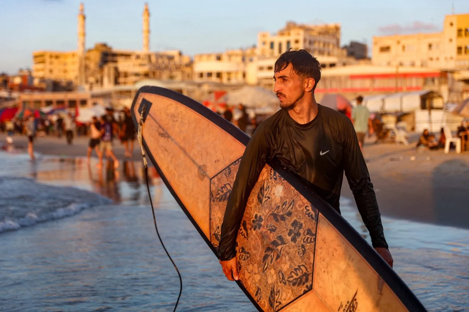 Gaza surfers seek solace from war in the sea