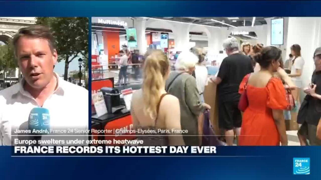Tourists on Champs-Élysées seek refuge from heat as more records tumble