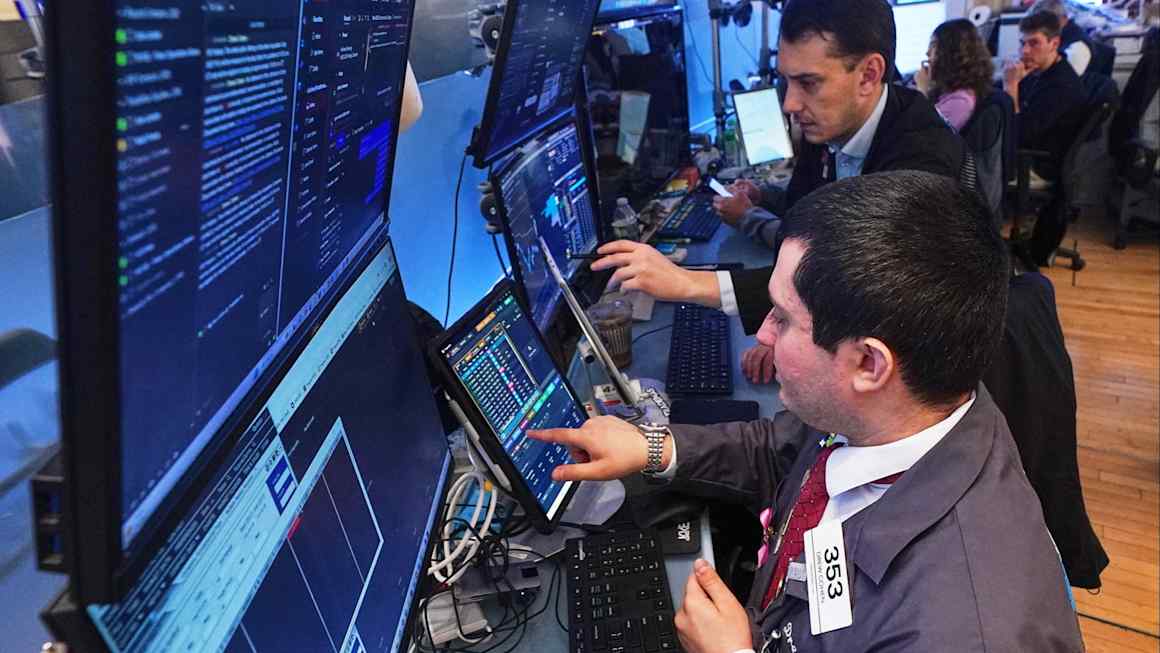 Wall Street rebounds as traders race back into chip stocks