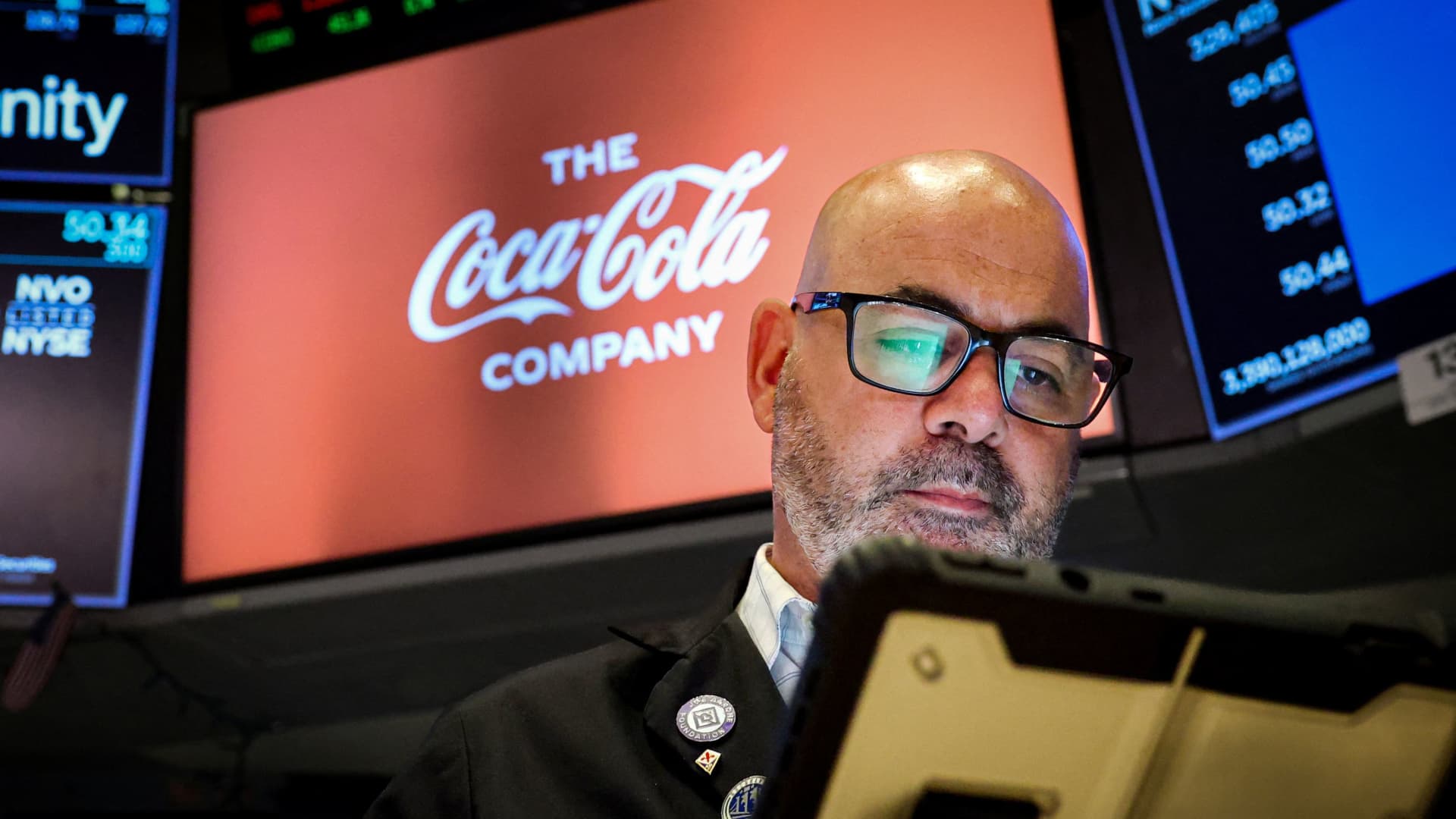 Coca-Cola tops earnings estimates, hikes full-year outlook as demand for drinks climbs