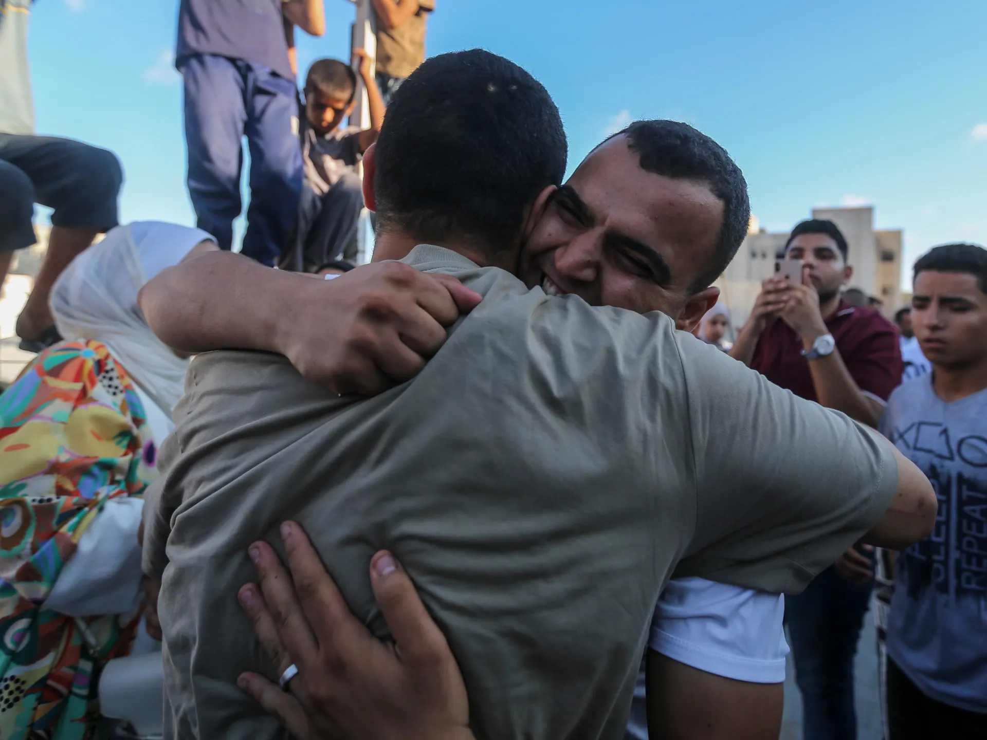 Sixty Palestinians detained by Israel return to Gaza, describe abuses