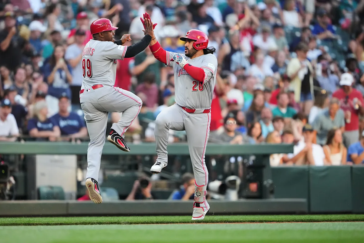 Suárez homers against former team and Burns throws 5 scoreless innings as Reds beat Mariners 4-2