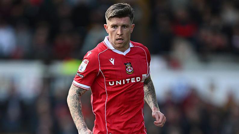 Wrexham's Windass to miss Leeds test due to injury
