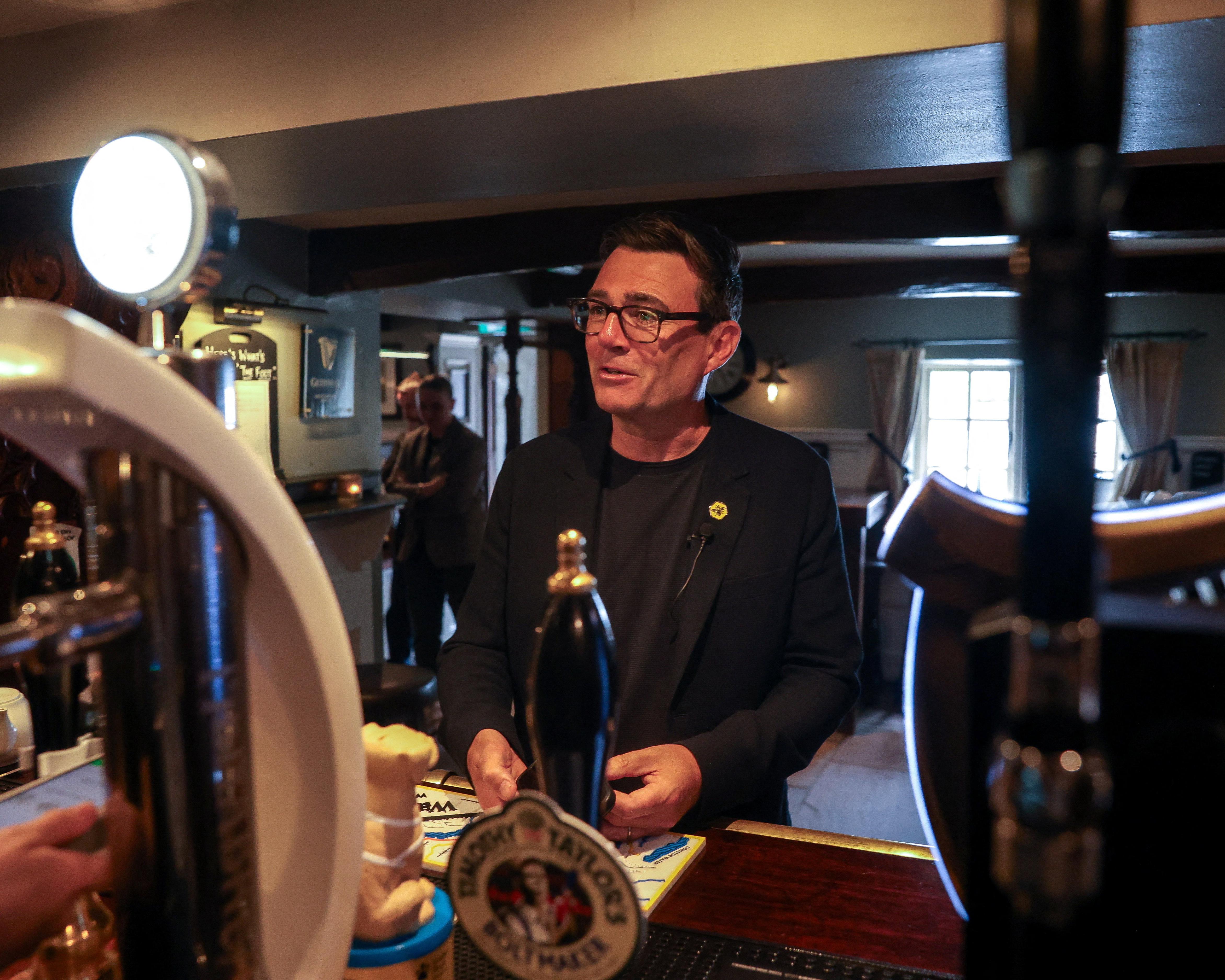 Burnham offers 20% cut in business rates for pubs, clubs and live music in England – UK politics live