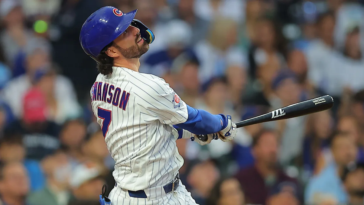 Cubs' Dansby Swanson leaves game vs. Cardinals with 'left side discomfort' after swing-and-miss