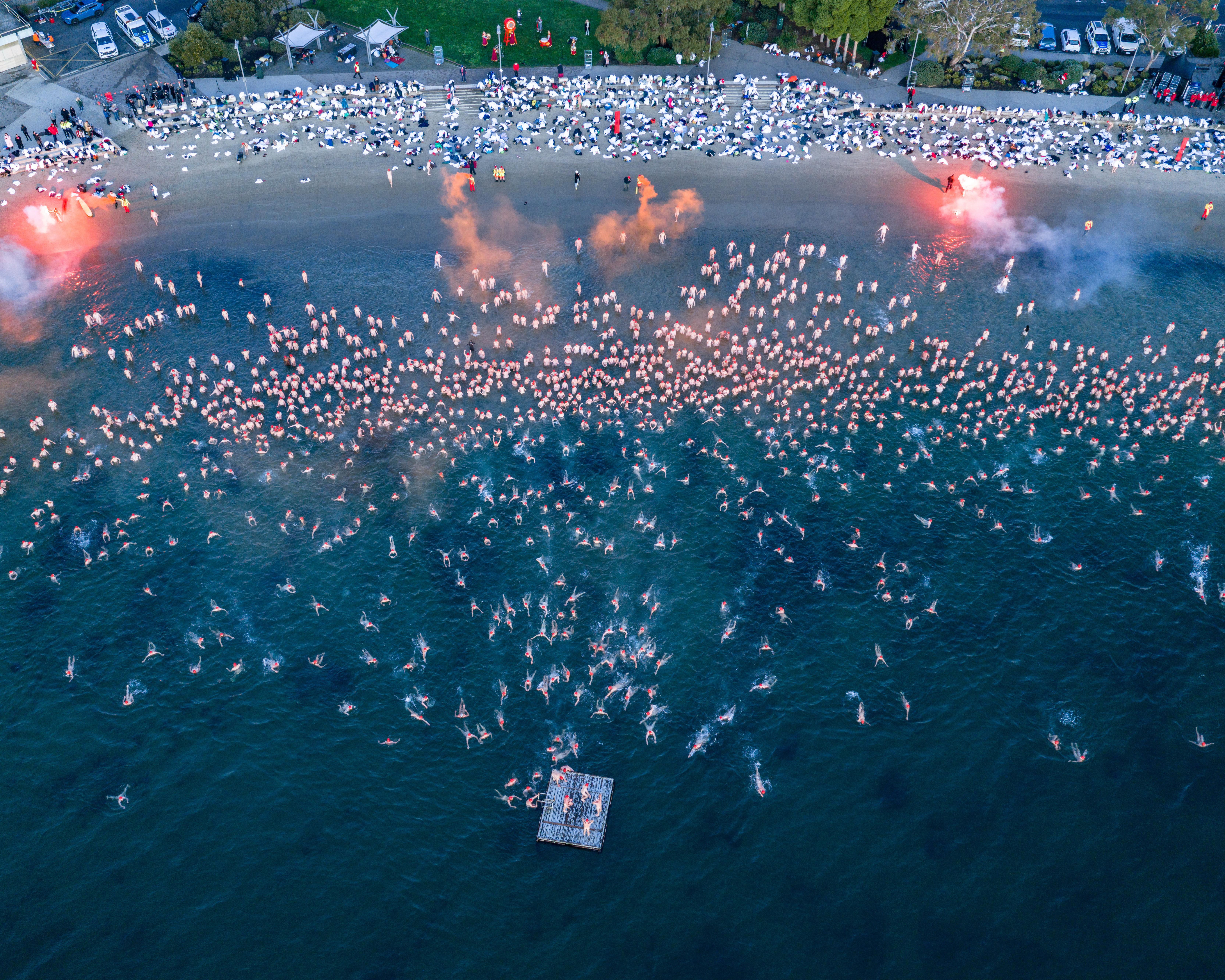 Bare bums brave the cold for Hobart’s Dark Mofo annual nude solstice swim – in pictures