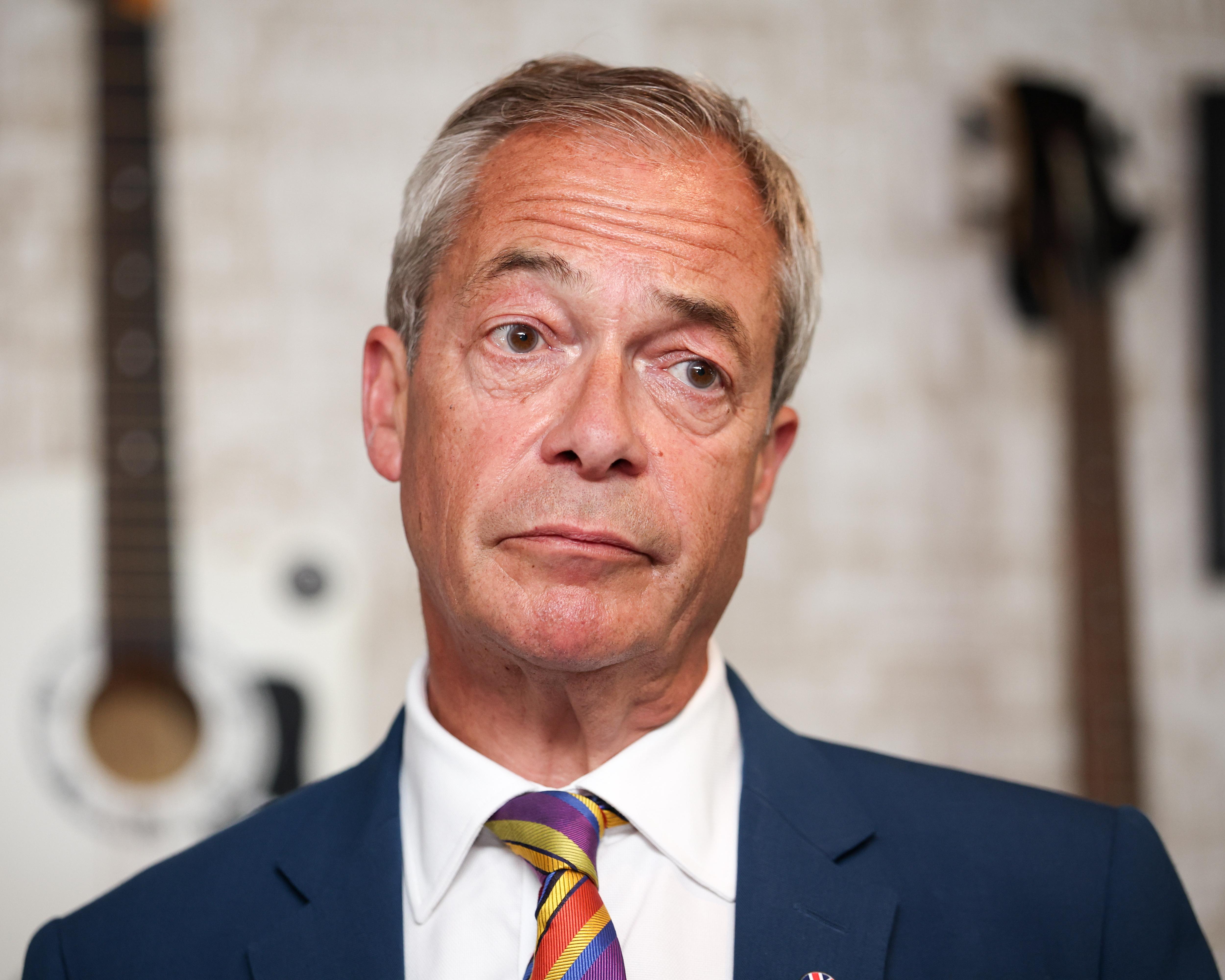 Report ‘phone hack’ to police or I will do it for you, Labour chair tells Farage