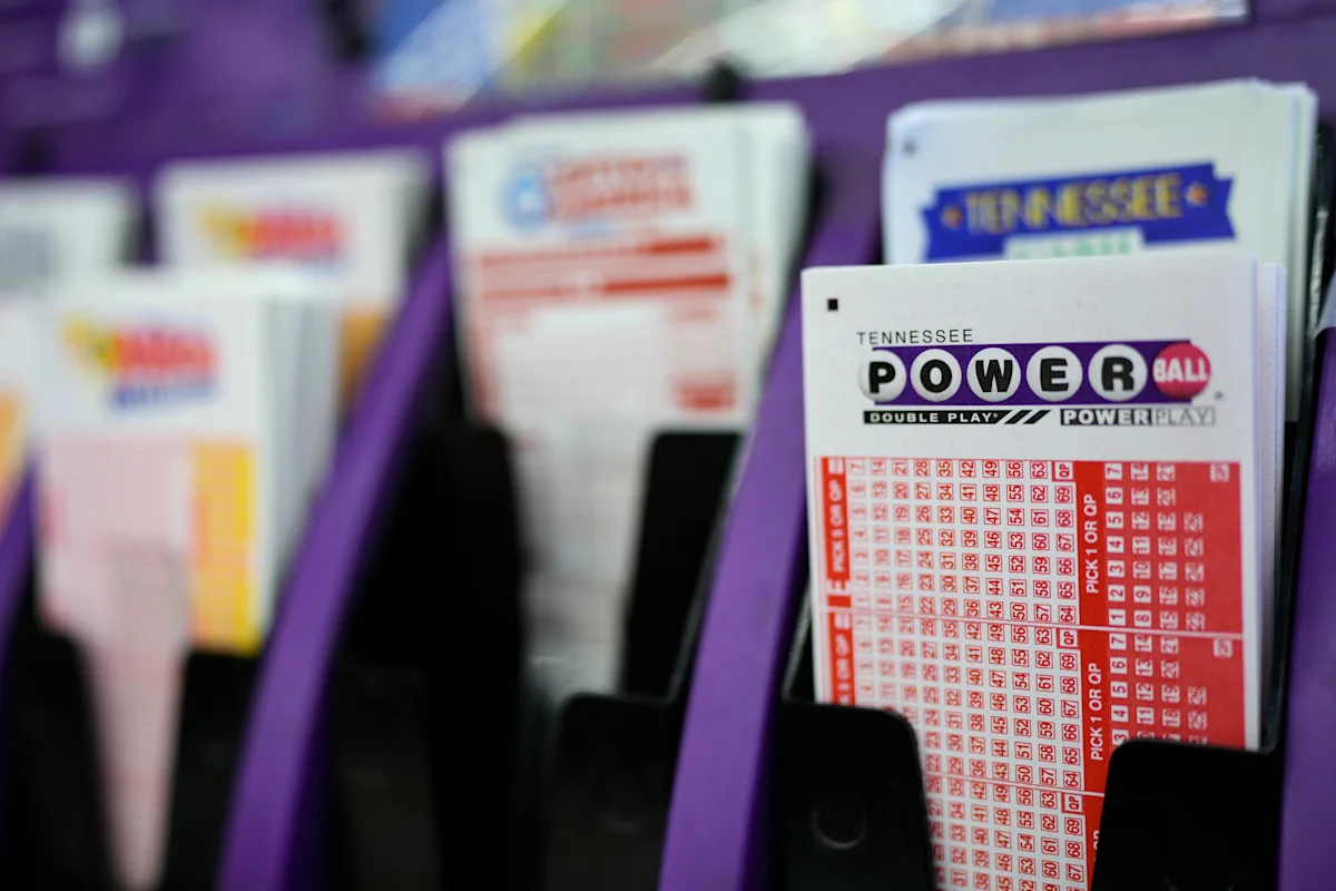 Powerball jackpot climbs to $975 million. What you'd pocket after taxes, and what to do with the rest.