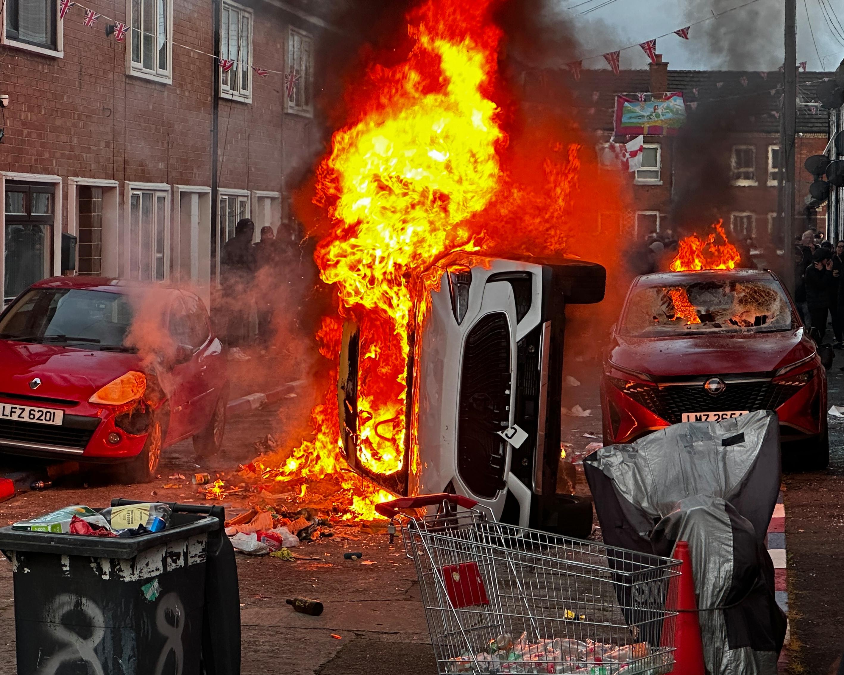 Man to appear in court over Belfast knife attack as rioting described as ‘race-based pogrom’ by SDLP leader – UK politics live