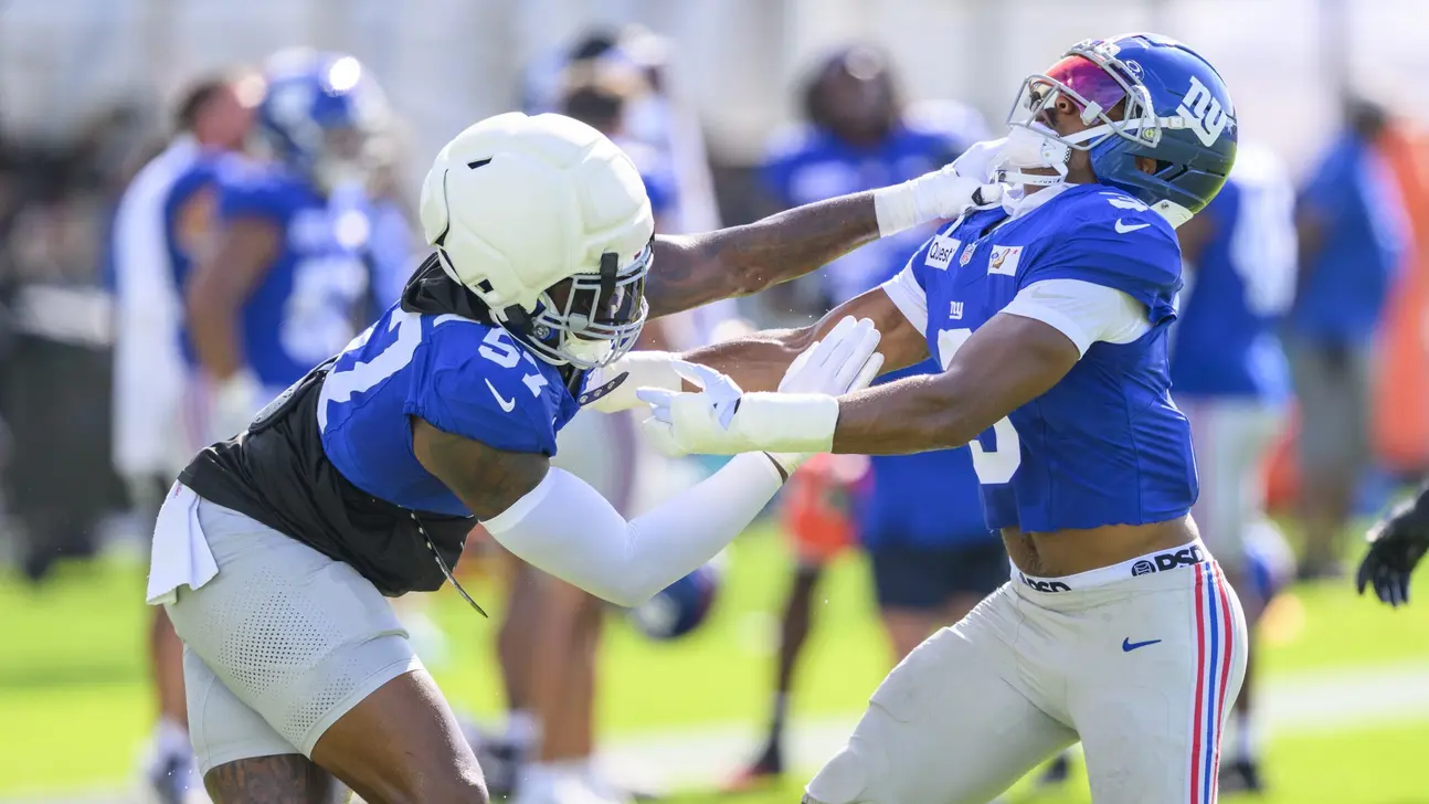
					Tempers Flare In Joint Practice As Giants Pass Rush Overpowers Dolphins
				