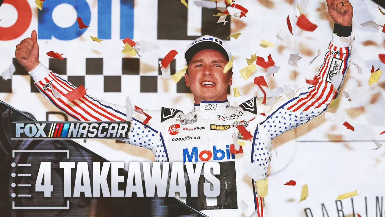 NASCAR driver celebrates with raised arms as confetti falls around him after a victory.