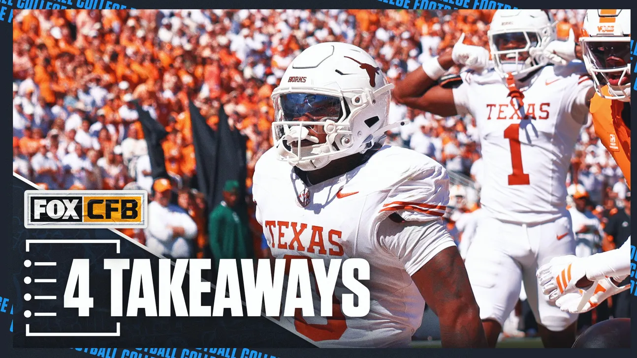 Texas player in a white helmet and uniform carries the ball as teammates and opponents appear behind him.