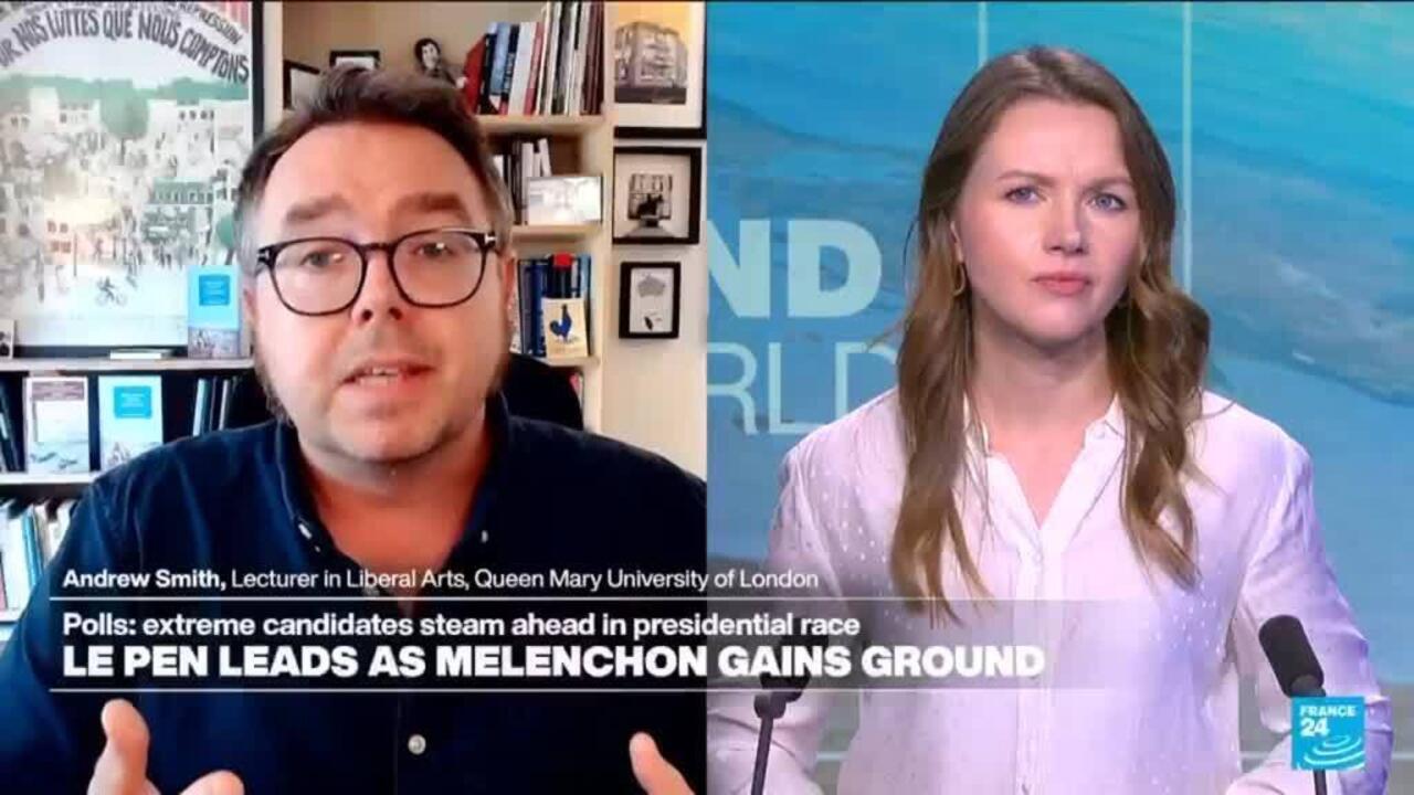 Split-screen television interview showing a male lecturer and female presenter with French election graphics