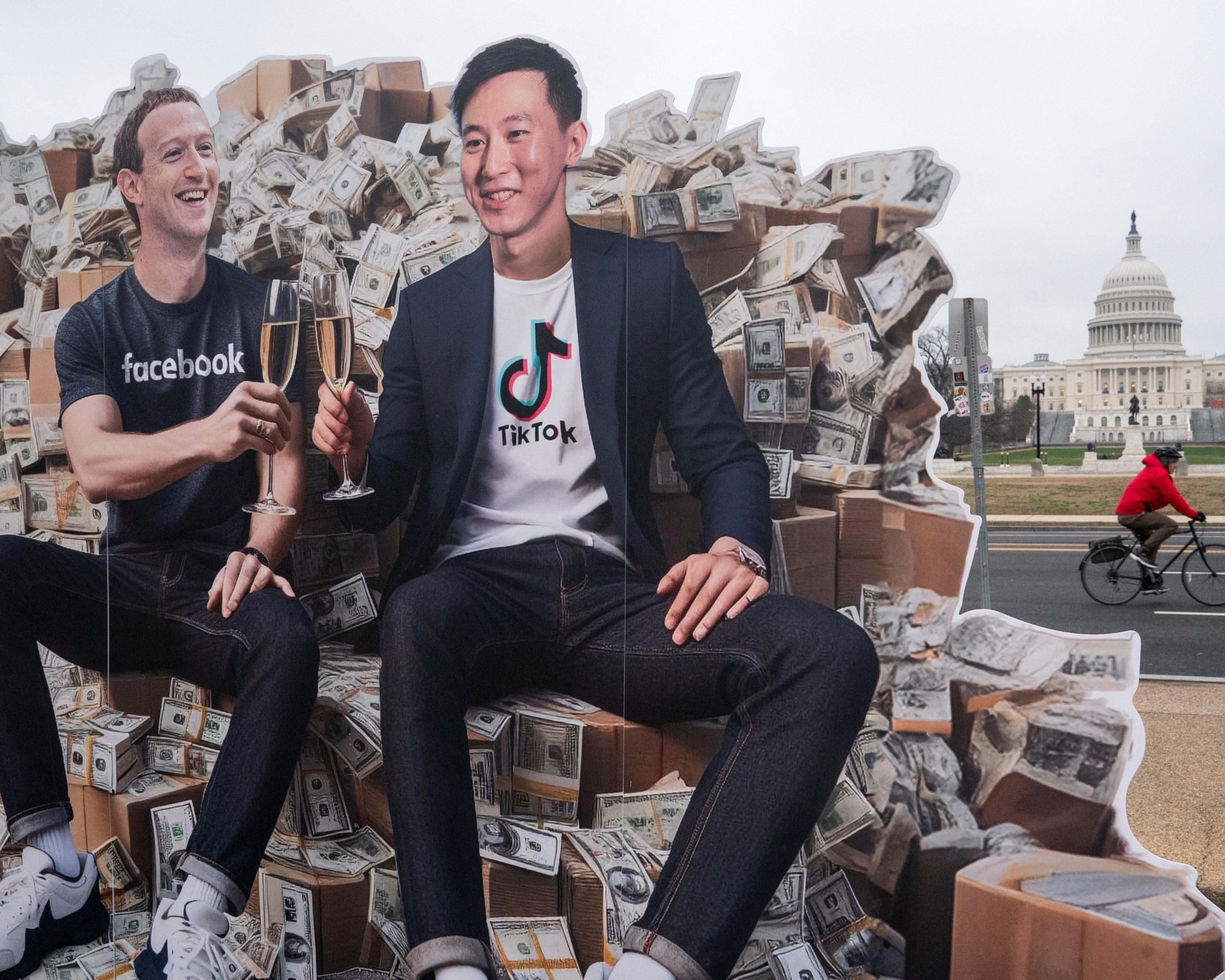Two men sit amid dollar bills, with a domed government building and cyclist visible behind them.