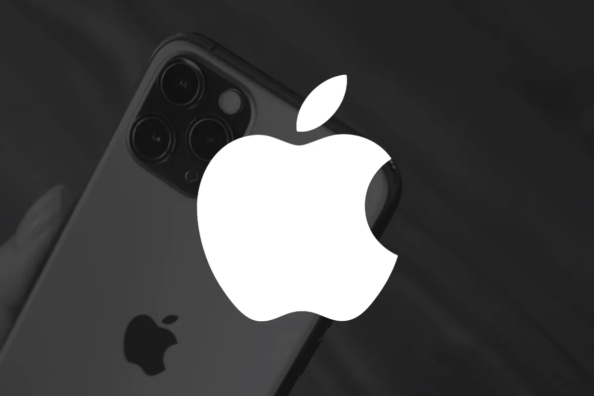 White Apple logo over a dark photograph of an iPhone showing its rear camera lenses