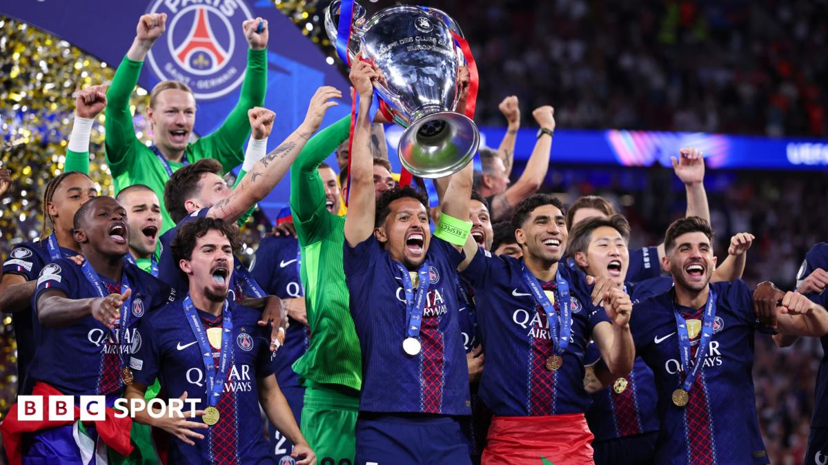 Football team celebrating with Champions League trophy amid confetti and cheering teammates