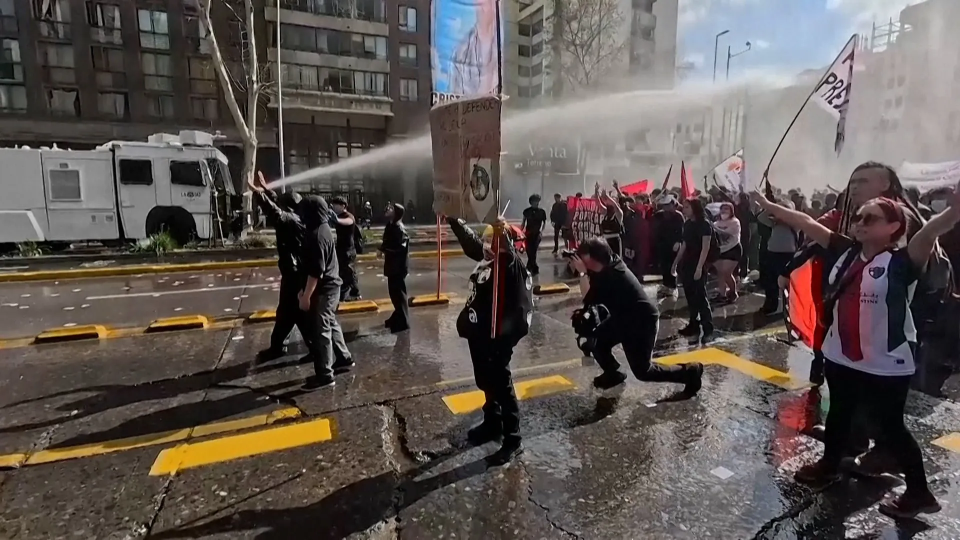 Chile police and protesters clash outside far-right forum