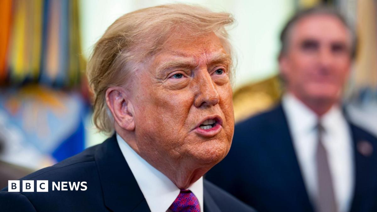 Donald Trump speaks in a close-up, with a blurred suited man behind him and BBC News branding visible.