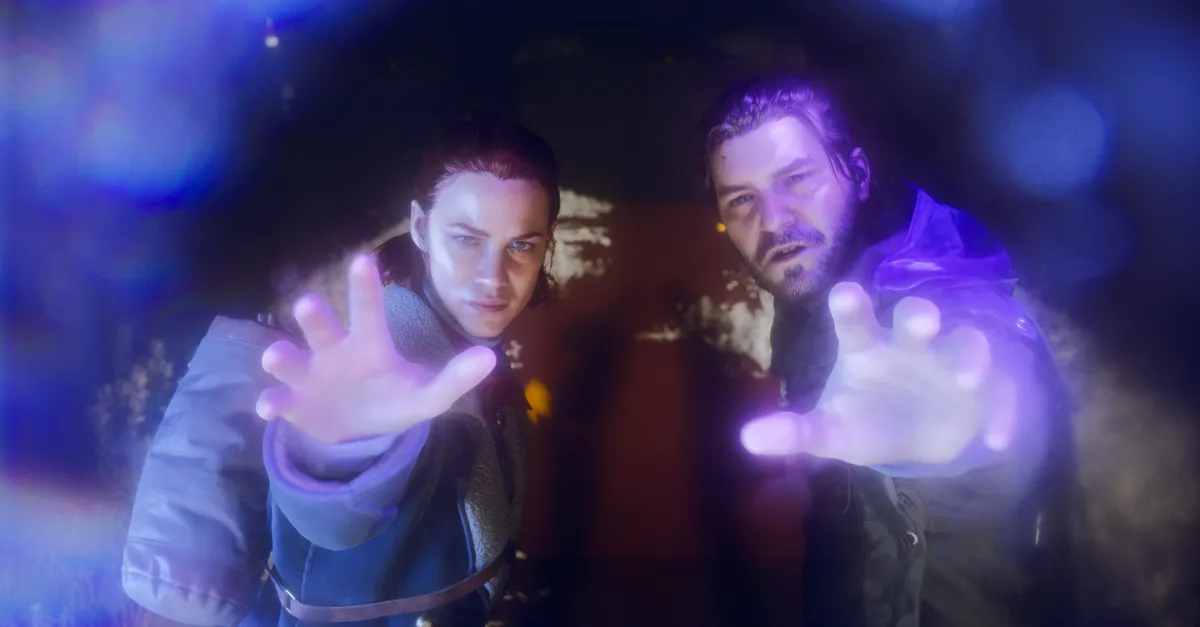 Two men reach toward the camera with glowing hands amid blue and purple light.