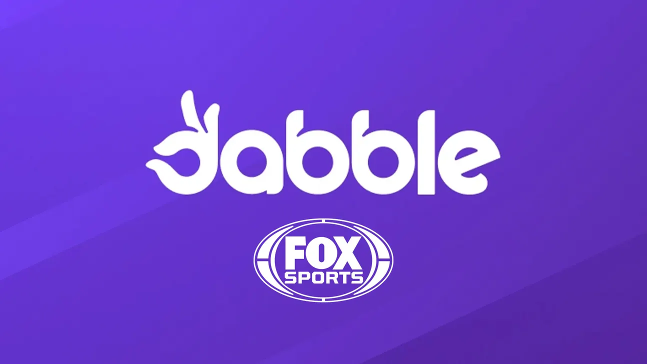 Purple promotional graphic featuring the Dabble logo above the FOX Sports logo.