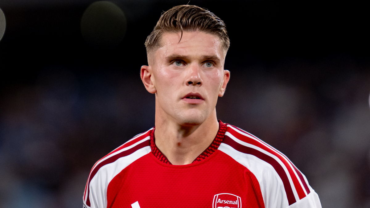 Arsenal forward Viktor Gyökeres wearing a red and white jersey during a football match