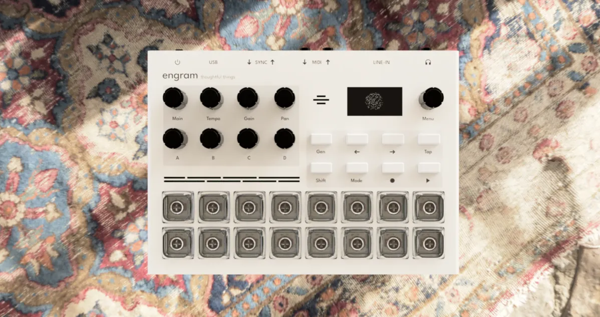White Engram music sampler with knobs, display, and two rows of square pads on a patterned rug.