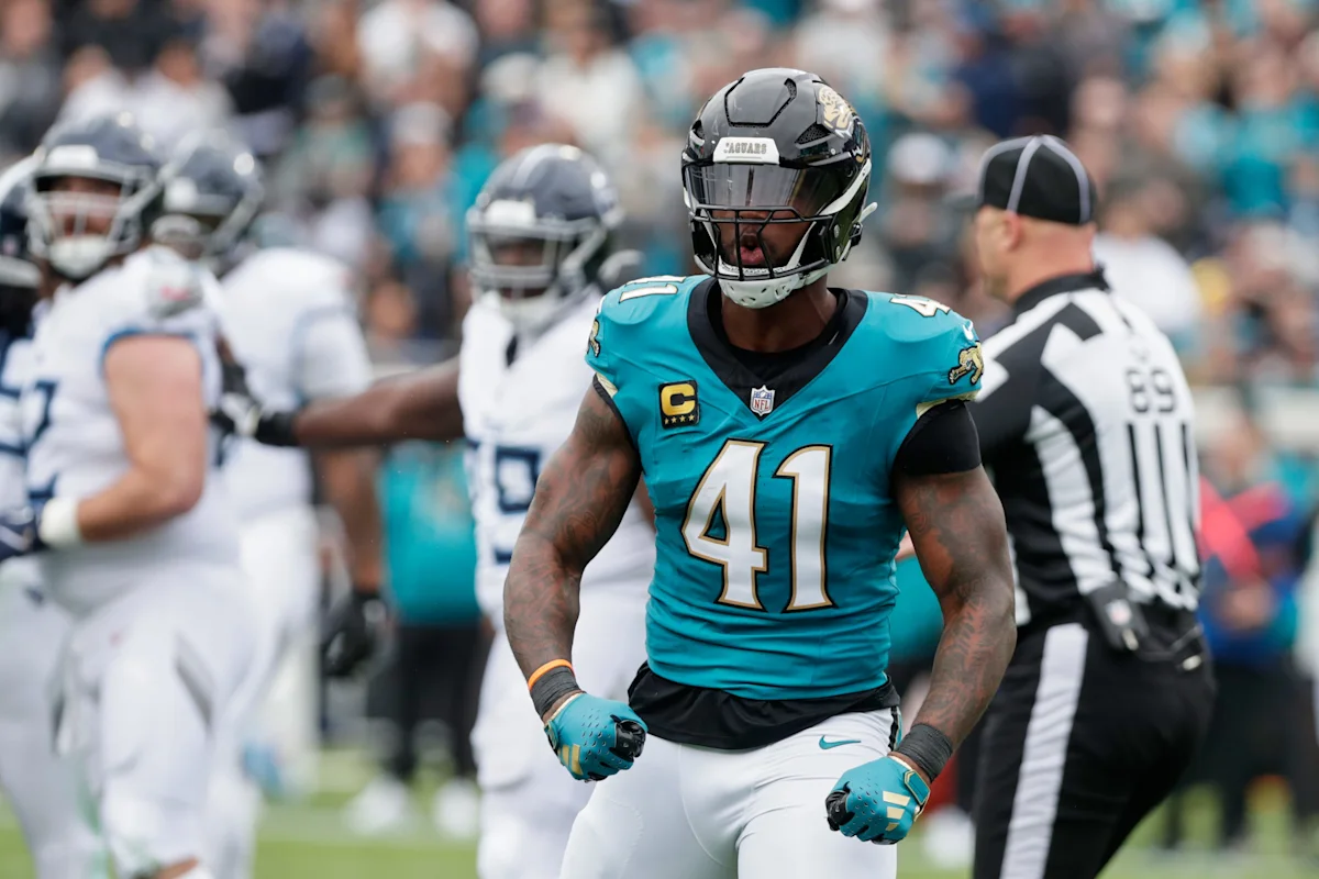 Jaguars defender wearing number 41 jersey stands on field during an NFL game