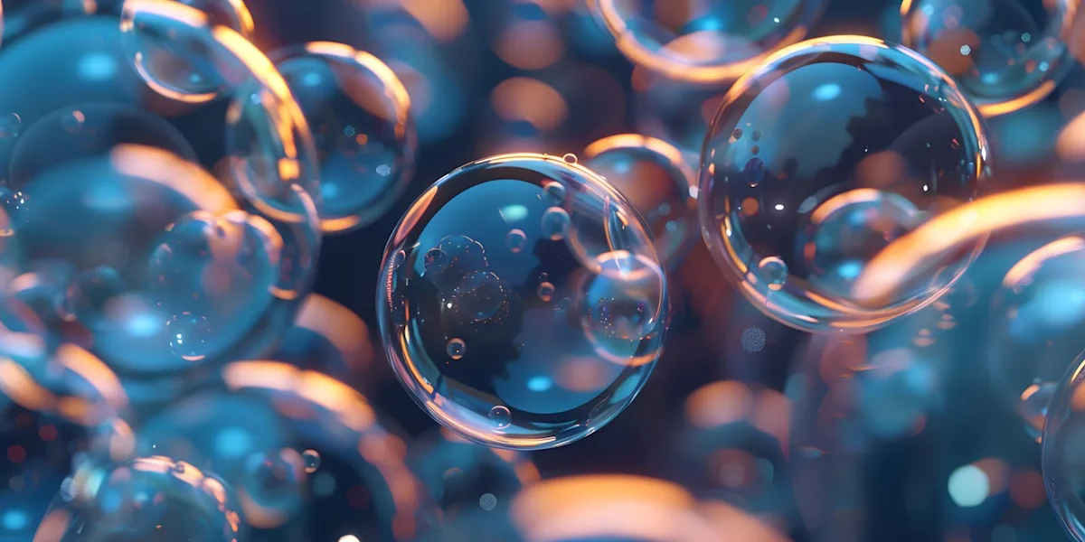 Glowing translucent bubbles float against a dark blue background with warm orange highlights.