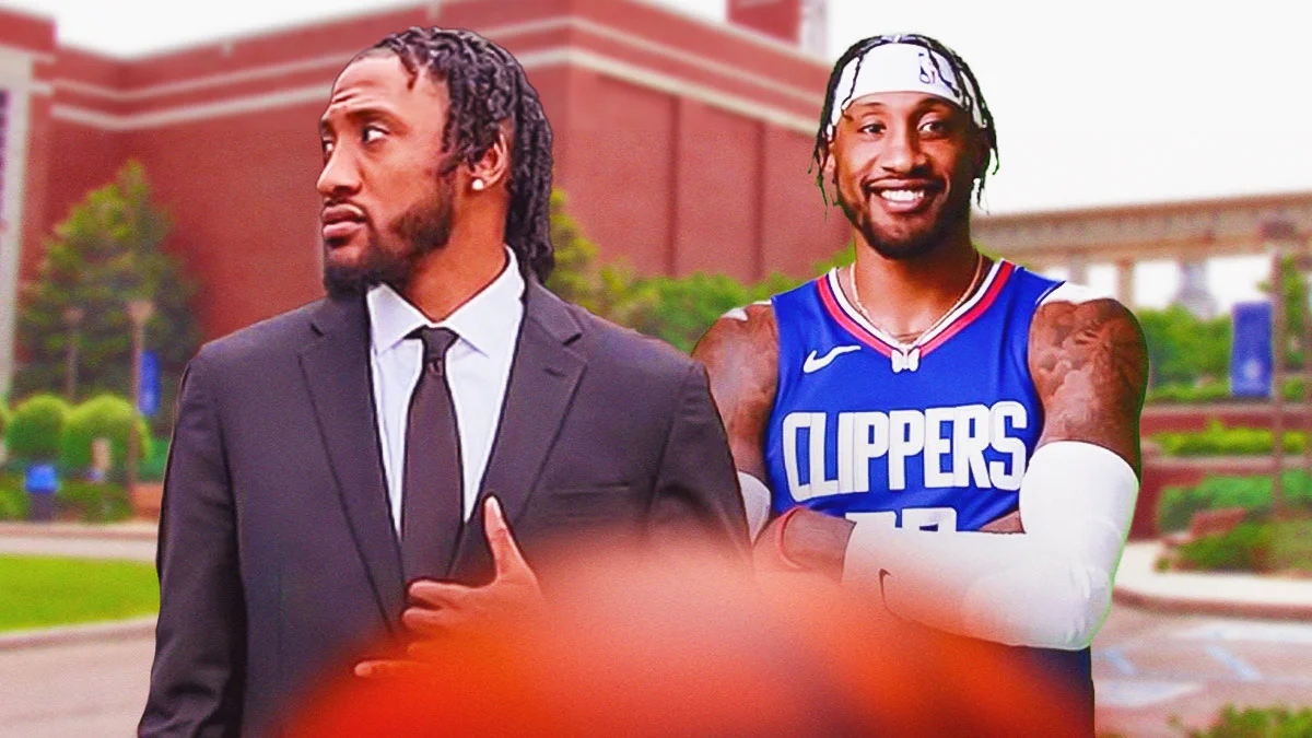 Suited man stands beside a smiling basketball player wearing a Clippers jersey outdoors.