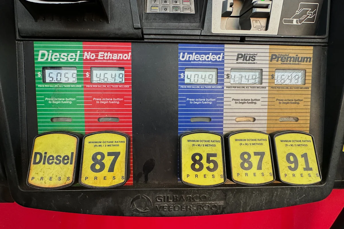 Gas pump display showing diesel and gasoline grades with prices and octane ratings.