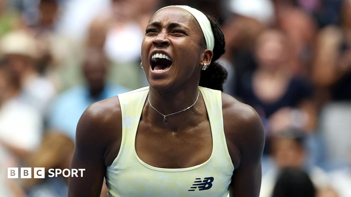 Tennis player Coco Gauff reacts intensely during a match, mouth open and arms tensed.