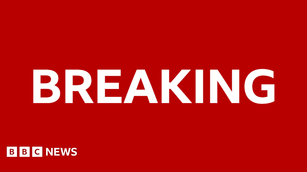 Red breaking news graphic with large white BREAKING text and BBC NEWS logo.