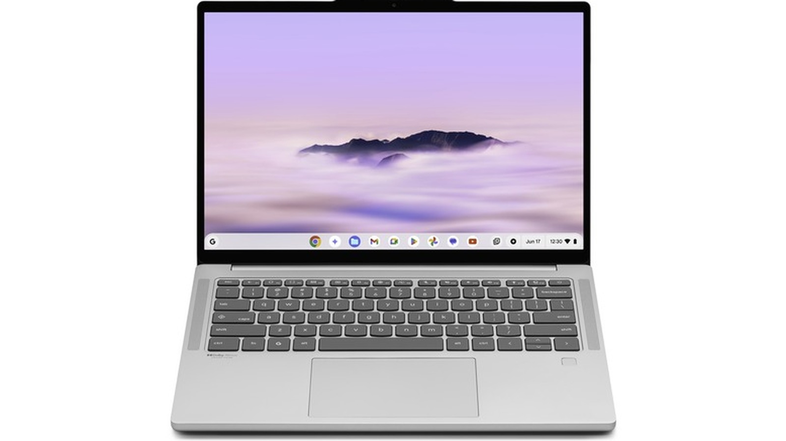 An open silver Chromebook with a lavender mountain-and-cloud wallpaper sits against a white background.
