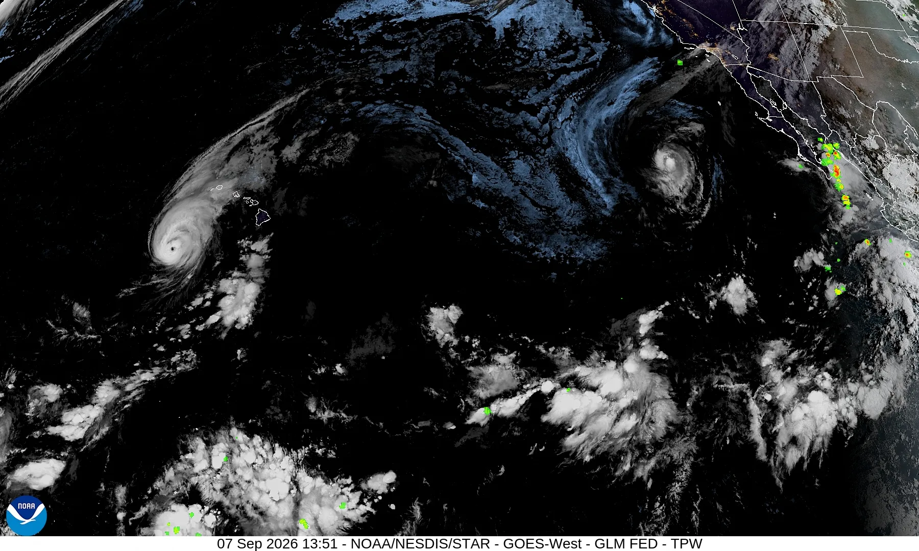 Satellite image showing tropical storms and cloud bands across the Pacific near Hawaii